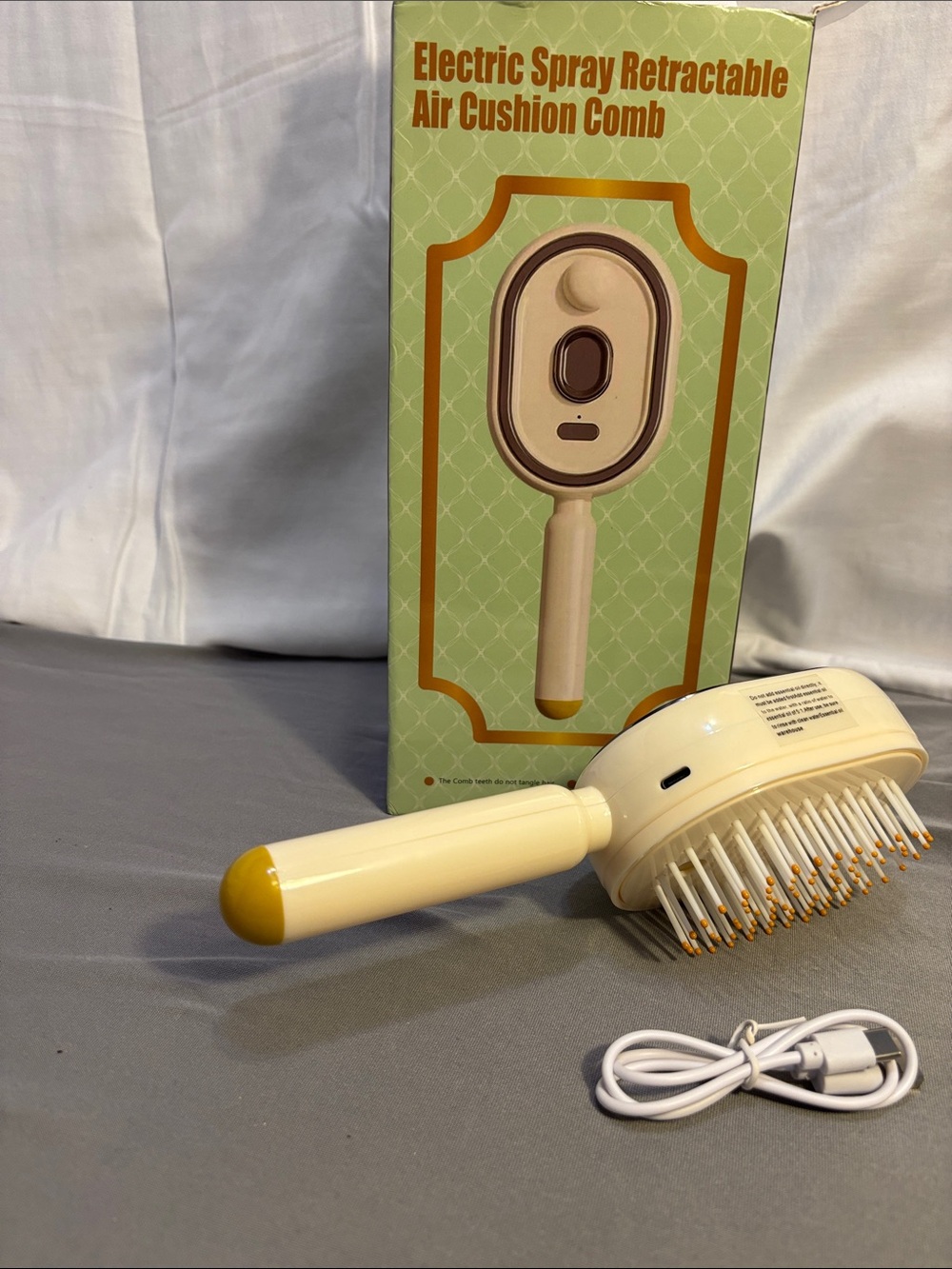 Electric Spray Retractable Air Cushion Comb - Cream/Yellow